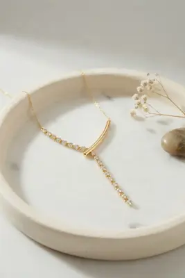 Pirinç Gold Renk Zirkon Taşlı Asimetrik Bar Model Kadın Kolye