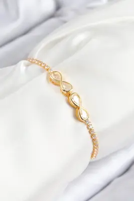 Pirinç Zirkon Taşlı Sonsuzluk Model Gold Renk Asansörlü Kadın Bileklik