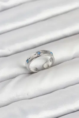 Pirinç Gümüş Renk Mavi Zirkon Taşlı Kutup Yıldızı Model Kadın Yüzük