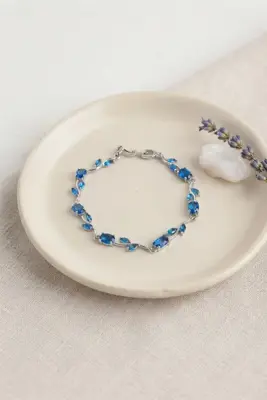Pirinç Gümüş Renk Mavi Zirkon Taşlı Çiçek Model Kadın Bileklik