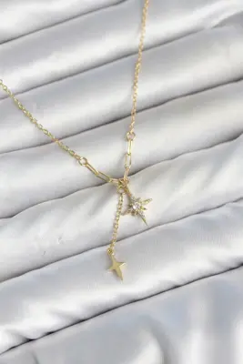Pirinç Gold Renk Zirkon Taşlı Minimal Sallantılı Kutup Yıldızı Model Kadın Kolye