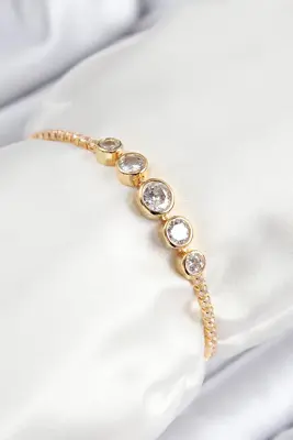 Pirinç Zirkon Taşlı Sıralı Daire Model Gold Renk Asansörlü Kadın Bileklik